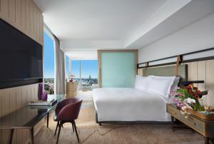 Luxury Corner Room with One King Bed and Club Millesime Access  room in Sofitel Sydney Darling Harbour