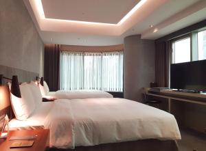 Phòng Deluxe 4 người (Deluxe Quad Room)