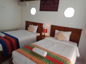 Phòng Tiêu Chuẩn 2 Giường Đơn Nhìn Ra Biển (Standard Twin Room with Sea View)