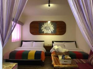 Phòng Tiêu Chuẩn 2 Giường Đơn Với Ghế Sofa (Standard Twin Room with Sofa)