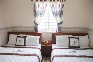 Phòng Giường Đôi/2 Giường Đơn Nhìn Ra Biển Ở Mặt Bên (Double or Twin Room with Side Sea View)