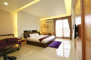 Phòng Deluxe Giường Đôi Có Ban Công (Deluxe Double Room with Balcony)