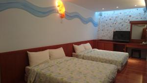 Phòng Hạng Tiết kiệm Cho 4 Người (Economy Quadruple Room)