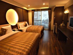 Phòng Deluxe 4 người (Deluxe Quadruple Room)
