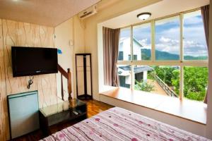 Phòng Bốn Người có Cảnh (Quadruple Room with View)