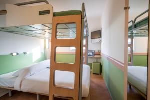 Family Room with One Double Bed and Two Bunk Beds room in Ibis Budget Fès