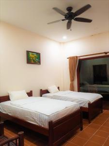 Phòng Tiêu Chuẩn 2 Giường Đơn Nhìn Ra Khu Vườn (Standard Twin Room with Garden View)