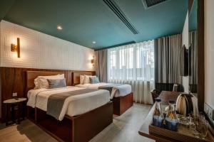 Phòng Hai Giường Đơn Loại Sang (Deluxe Twin Room)