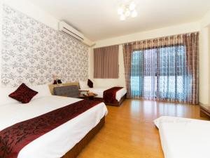 Suite Gia Đình Deluxe (Deluxe Family Suite)