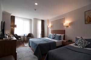 Comfort Triple Room room in Nomade Hotel Exclusive