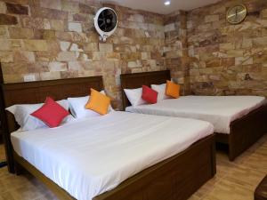 Deluxe Double Room (2 Adults + 1 Child) room in Midway Inn Hotel