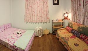 Phòng Tiêu Chuẩn Giường Đôi Với Phòng Tắm Chung (Standard Double Room with Shared Bathroom)