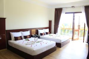 Phòng Deluxe Có 2 Giường Cỡ Queen (Deluxe Queen Room with Two Queen Beds)