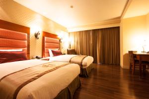 Phòng Hai Giường Đơn Loại Sang (Deluxe Twin Room)