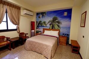 Phòng Giường Đôi Lớn Loại Sang (Deluxe Queen Room)