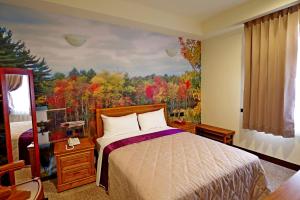 Phòng Giường Đôi Lớn Loại Sang (Deluxe Queen Room)