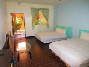 Phòng 4 người nhìn ra vườn (Quadruple Room with Garden View)