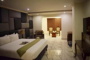 Deluxe Single Room with Balcony room in Grand Millennium Hotel
