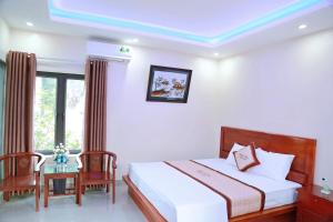 Phòng Deluxe Giường Đôi Có Ban Công (Deluxe Double Room with Balcony)