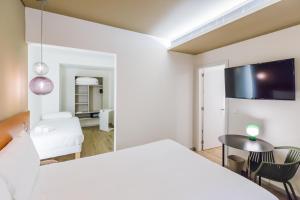 Superior Room with One Queen Bed and One Single Bed (3 Adults) room in Ibis Styles Lisboa Centro Marquês de Pombal