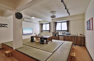 Phòng gia đình với phòng tắm riêng. (Family Room with Private Bathroom)