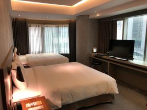 Phòng Deluxe 4 người (Deluxe Quad Room)