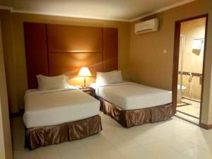 Phòng Hai Giường Đơn Loại Sang (Deluxe Twin Room)