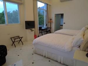 Phòng 4 Người Có Ban Công (Quadruple Room with Balcony)