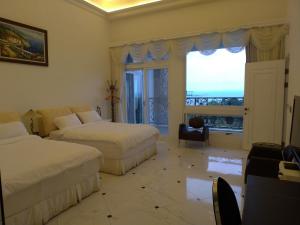 Phòng Bốn Người Có Phòng Tắm Riêng (Quadruple Room with Private Bathroom)