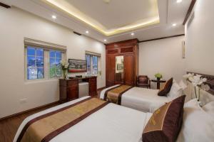 Phòng Hai Giường Đơn Loại Sang (Deluxe Twin Room)