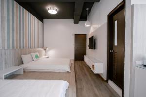 Phòng Bốn Người Có Phòng Tắm Riêng (Quadruple Room with Private Bathroom)
