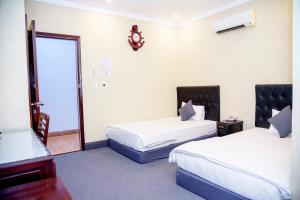 Phòng Hai Giường Đơn Loại Sang (Deluxe Twin Room)
