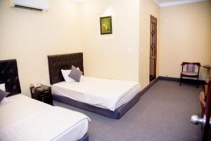 Phòng Hai Giường Đơn Loại Sang (Deluxe Twin Room)
