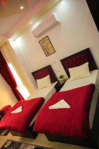 Deluxe Double Room with Balcony room in Queen Pyramids View Inn
