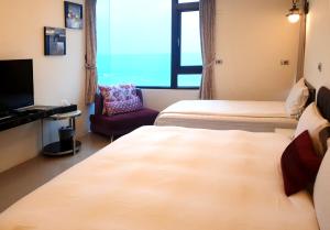 Phòng Deluxe Giường Đôi Nhìn Ra Biển Từ Phía Bên Cạnh (Deluxe Double Room with Side Sea View)