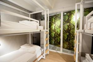 Economy Quadruple Room with Shared Bathroom room in Siam Eco Hostel