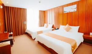 Phòng Deluxe Có 2 Giường Cỡ Queen (Deluxe Queen Room with Two Queen Beds)