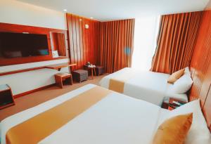 Phòng Deluxe Có 2 Giường Cỡ Queen (Deluxe Queen Room with Two Queen Beds)