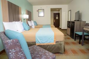 Queen Room with Two Queen Beds and Balcony room in Pigeon River Inn