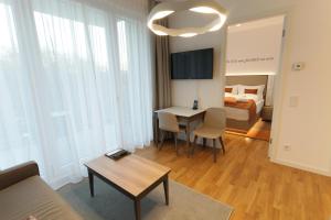 	Apartment Deluxe with Living Area and Balcony room in HighPark Berlin am Potsdamer Platz