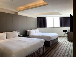Phòng Tiêu chuẩn 4 người (Standard Quadruple Room)