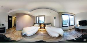 Phòng Hai Giường Đơn Loại Sang (Deluxe Twin Room)