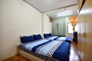 Phòng 4 Người Có Phòng Tắm Chung (Quadruple Room with Shared Bathroom)