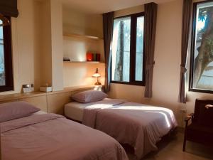 Phòng 2 Giường Đơn Nhìn Ra Khu Vườn (Twin Room with Garden View)