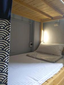 Giường trong Phòng ngủ tập thể cả Nam và Nữ 4 Người (Bed in 4-Bed Mixed Dormitory Room)