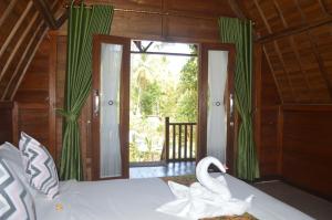 Phòng Giường đôi Deluxe (2 Người lớn + 1 Trẻ em) (Deluxe Double Room (2 Adults + 1 Child))