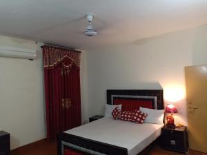 Economy Quadruple Room room in White Rose Hotel Lahore
