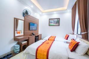 Phòng Hai Giường Đơn Loại Sang (Deluxe Twin Room)