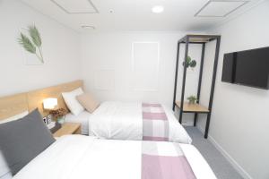 Phòng tiết kiệm gia đình (Economy Family Room)