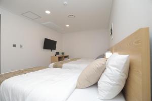 Phòng tiết kiệm 3 người (Economy Triple Room)